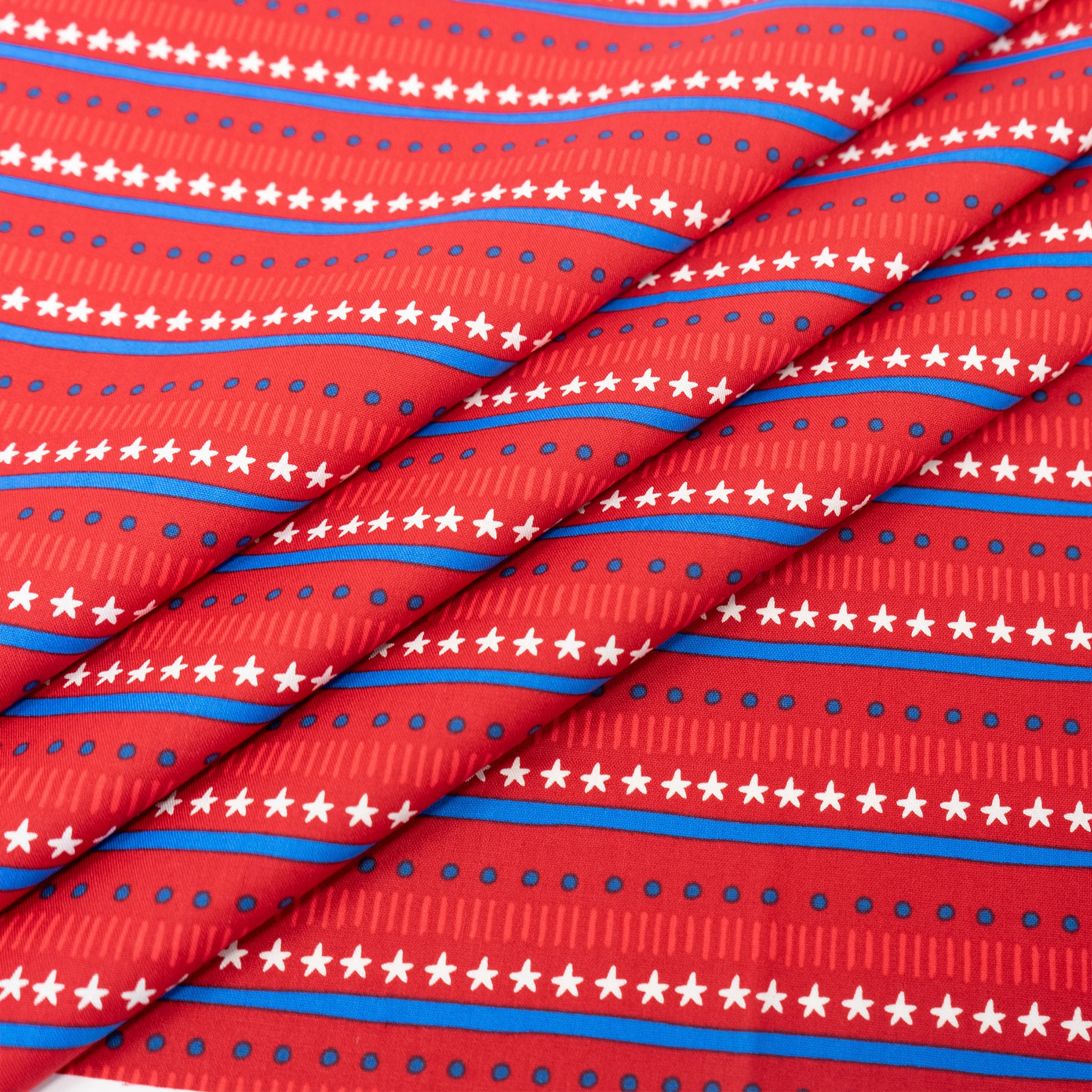 SINGER® Fabric, 100% Cotton, Stars & Dots On Royal Red, Cut by the Yard 3 SINGER® Fabric, 100% Cotton, Stars & Dots On Royal Red, Cut by the Yard